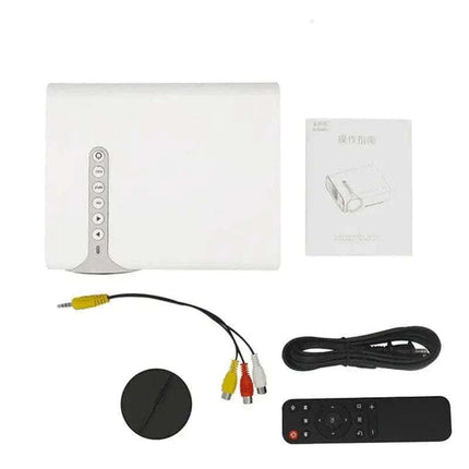 Arrangement of a white projector, instruction manual, AV cable, power cord, remote control, and lens cap.